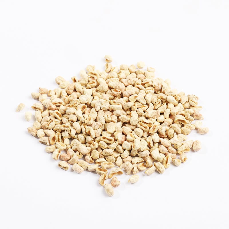 Corncob dry finishing media granules close-up on white background
